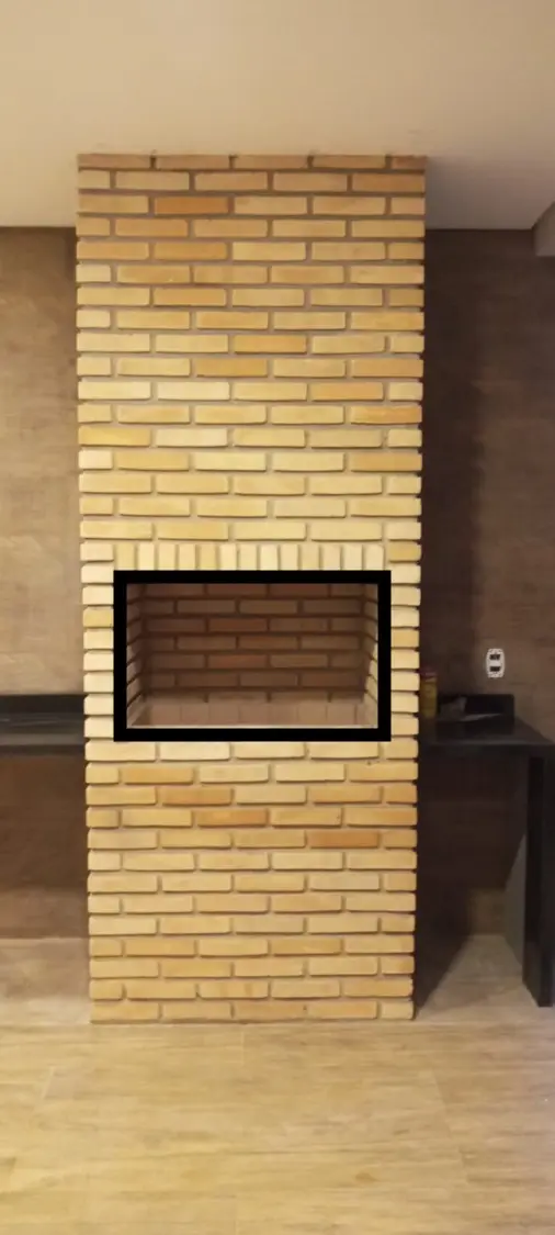 Churrasqueira de tijolinho claro aparente em coluna